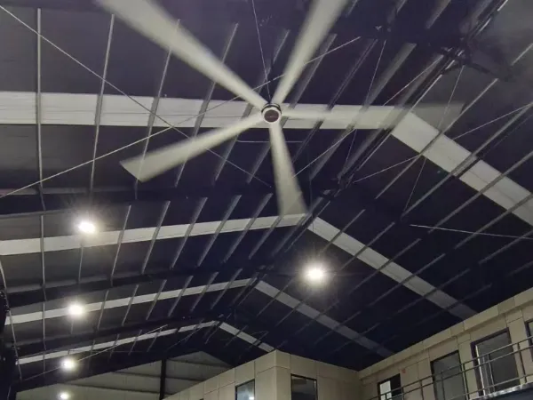 Industrial HVLS fan moving air in a warehouse