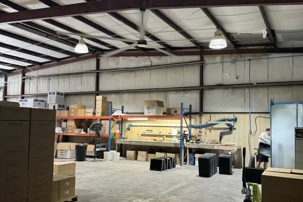 industrial hvls ceiling fan in a logistics center