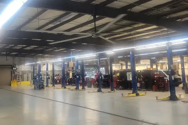 Giant HVLS industrial ceiling fan in a large warehouse